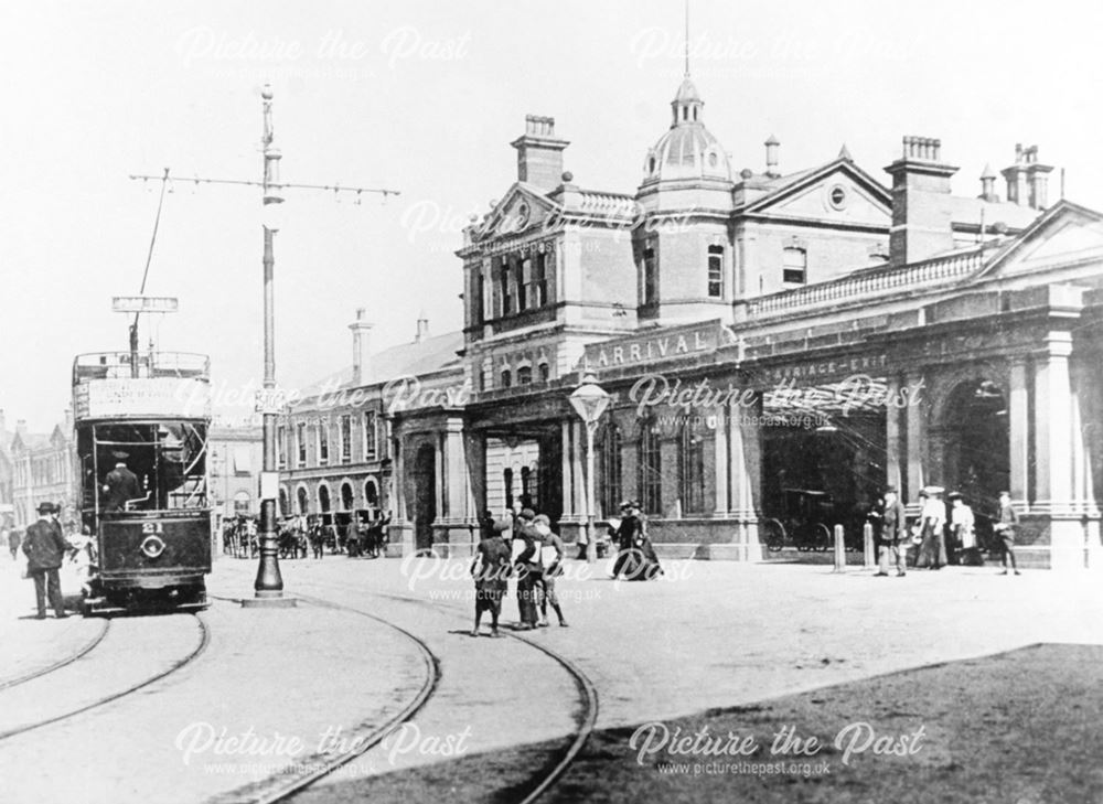 Electric Tram and horse-drawn cabs outside Derby Midland Station