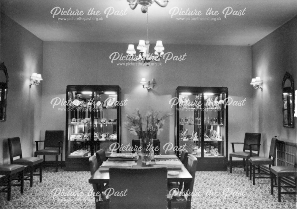 Royal Crown Derby Porcelain Factory - Reception room with display cases