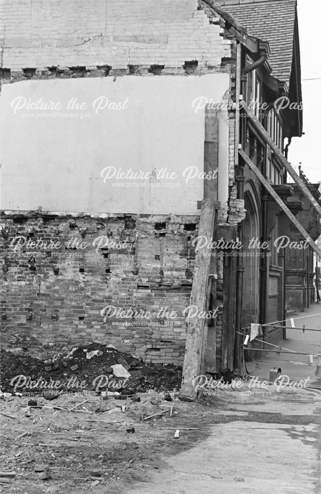 Crack in the supporting wall of Flint, Bishop and Barnett after the adjoining building was demolishe