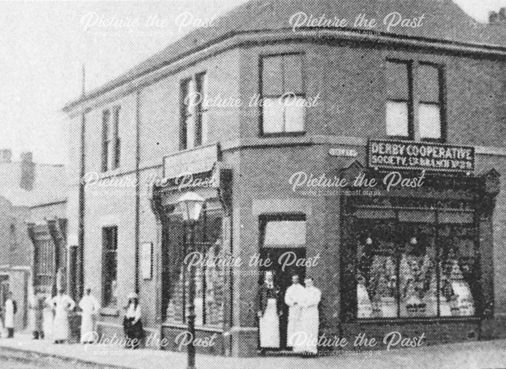 Shop assistants outside the Derby Co-operative Society Ltd's branch no 28