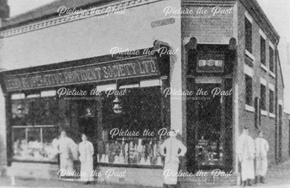 Shop assistants outside the Derby Co-operative Provident Society Ltd's Roe Street branch, c 1900s ?