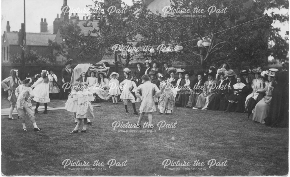 Outdoor display of dancing, with audience