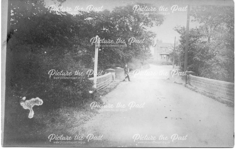 Lane with bridge, location not known