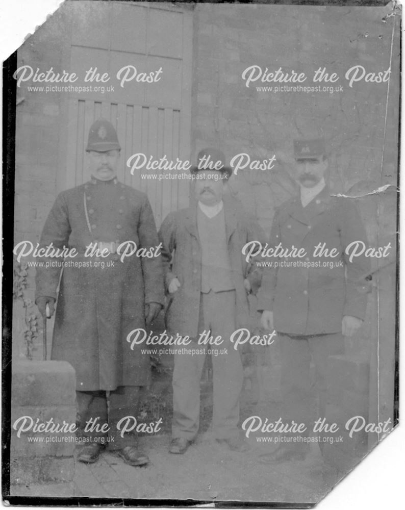 Three men including policeman