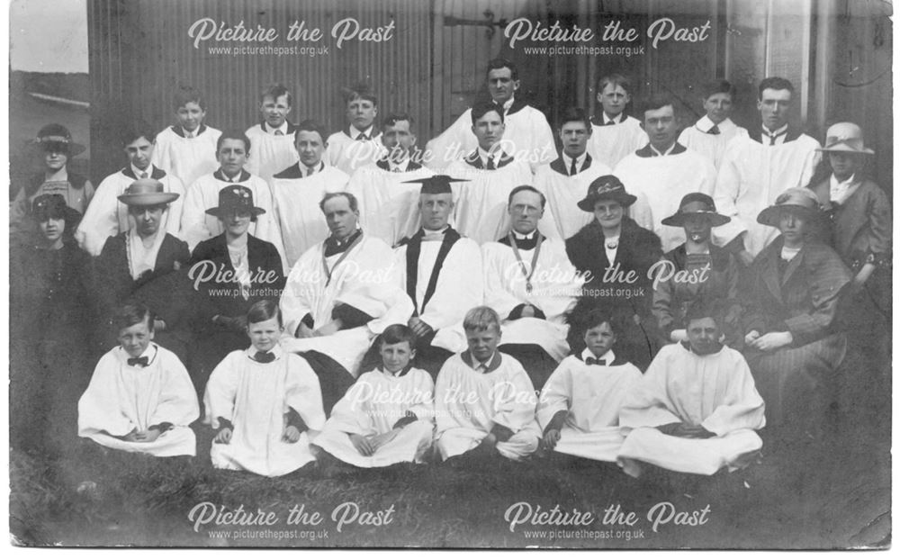 Posed group of choirboys and men