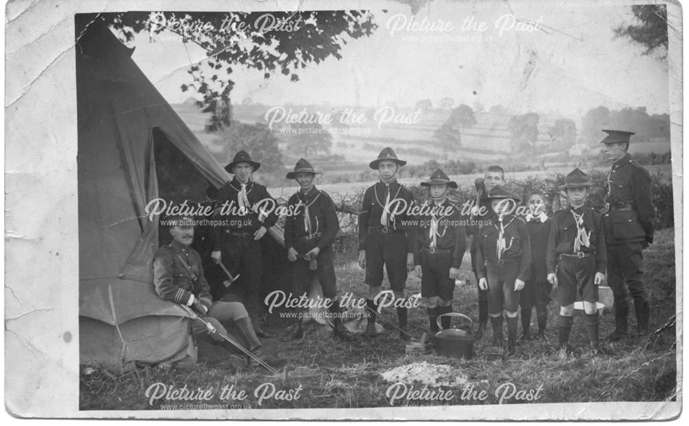 Scouts and soldiers at camp.