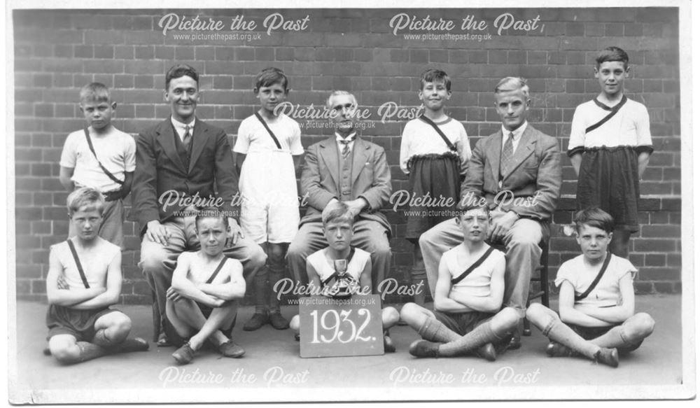 Boys athletics club (?) with trophy