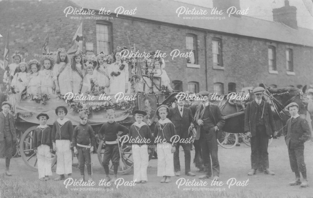 Carnival cart and horse, with boys and girls dressed up