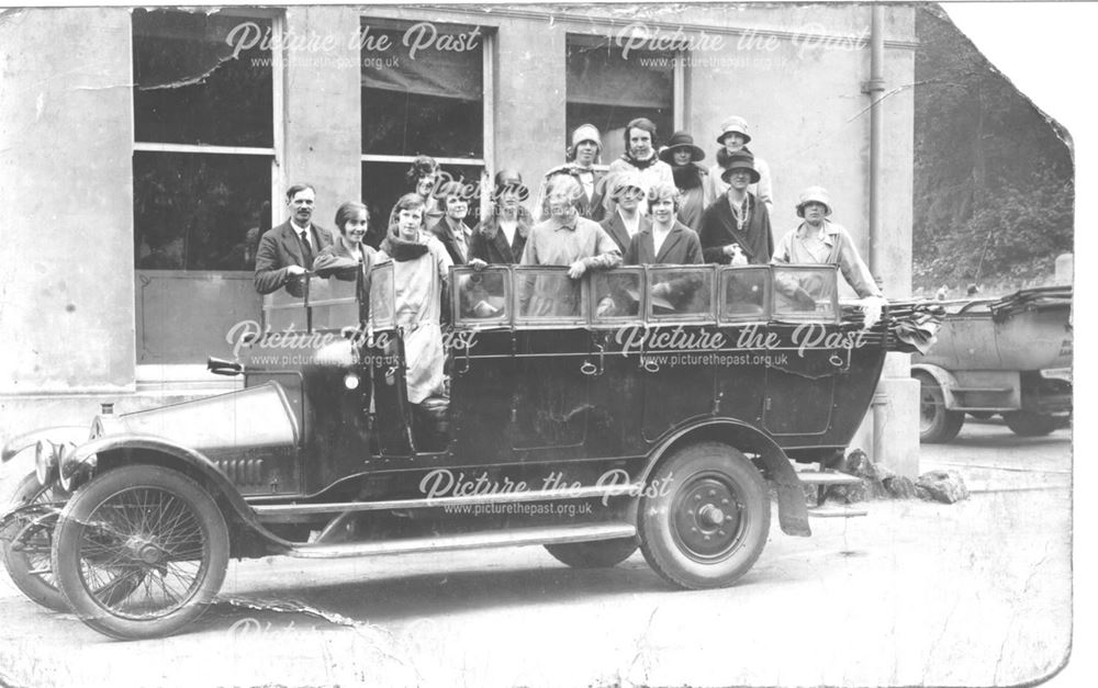 Ladies on old style bus.