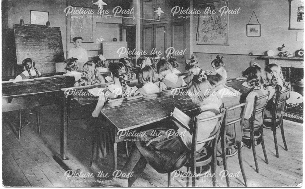 Classroom at school with a girls' class in progress