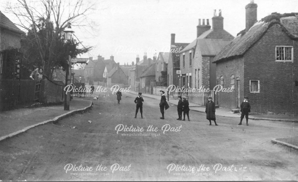 Children Playing, Main Street, East Leake, c 1890s