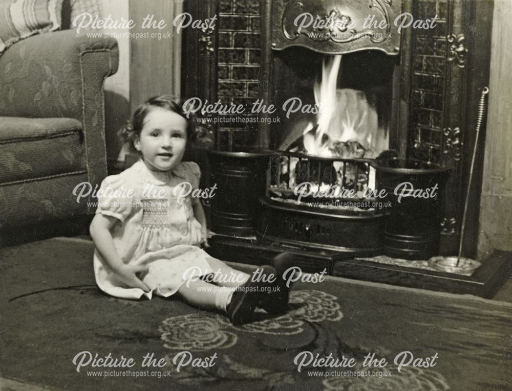 Girl Sitting by a Fire, c 1930s-40s