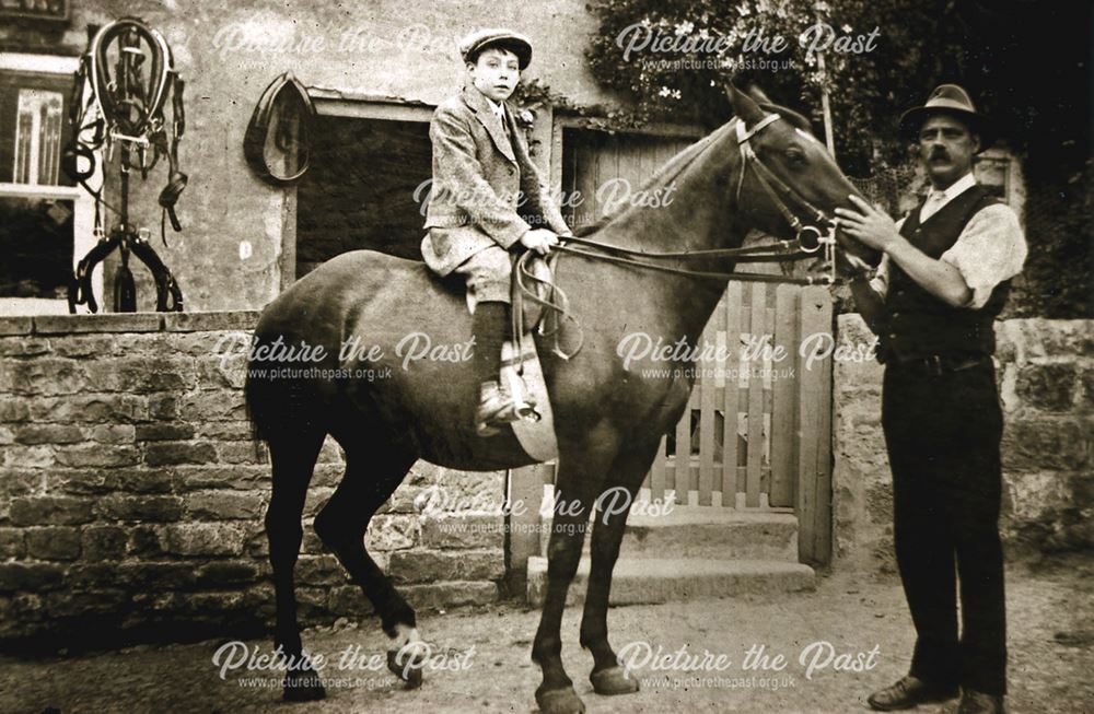 Mr Linley, saddler and his son on horse, Whitwell, 1908