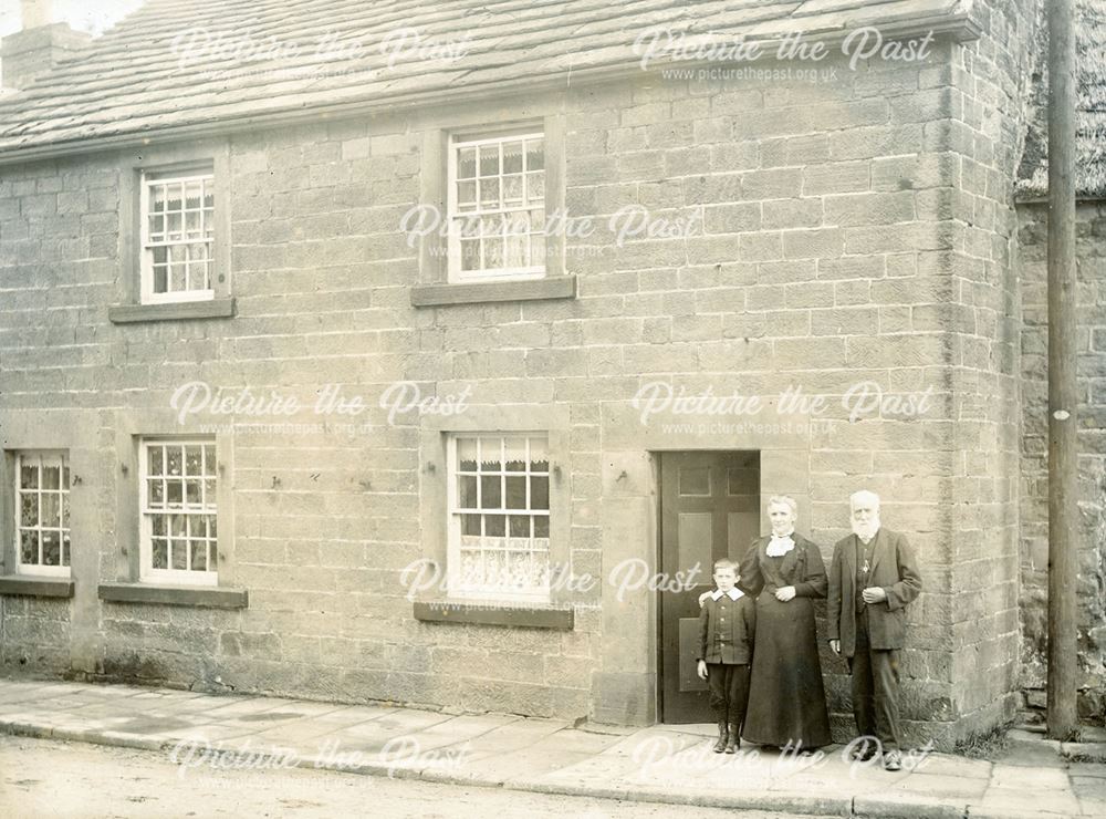 Couple outside a cottage on Butts Road, Ashover, c 1905 ?