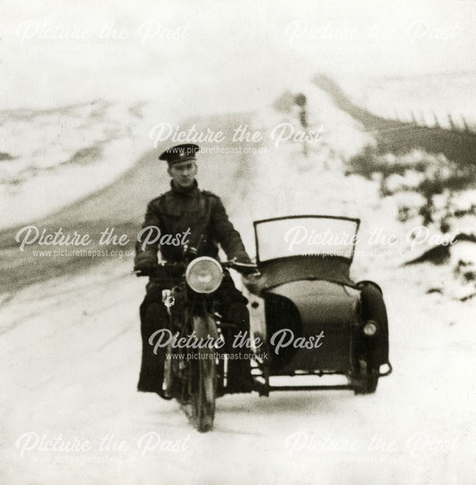 AA patrolman and motorcycle combination, Peak District, c 1930s ?