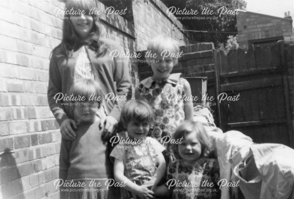 Members of the Elliott Family in Backyard of 72 Dryden Street, Nottingham, 1966