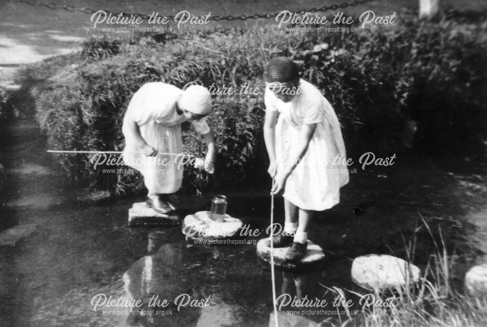 Mary Bently and Madelaine Stevens Fishing in the Beck, Thurgarton, c 1920s