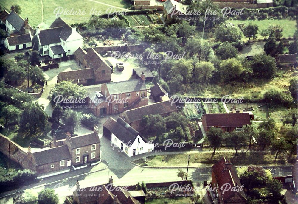 Aerial view showing Main Street and Church Lane, Upton, 1964