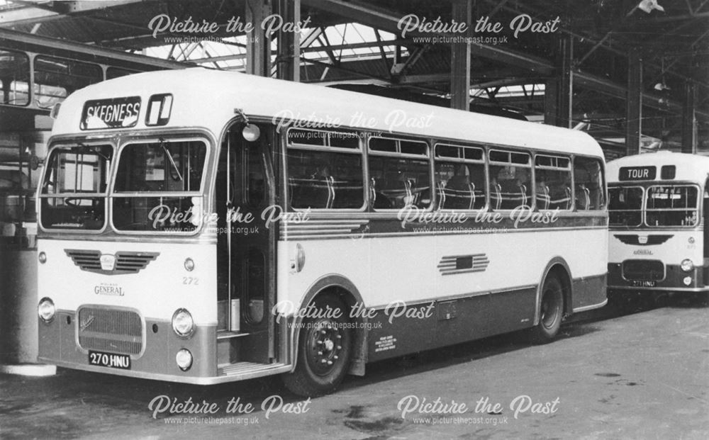 Tour buses belonging to Midland General Omnibus Company in the garage