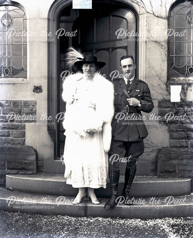 Portrait of an Army Officer and His Wife on the Steps of a House, c 1920s