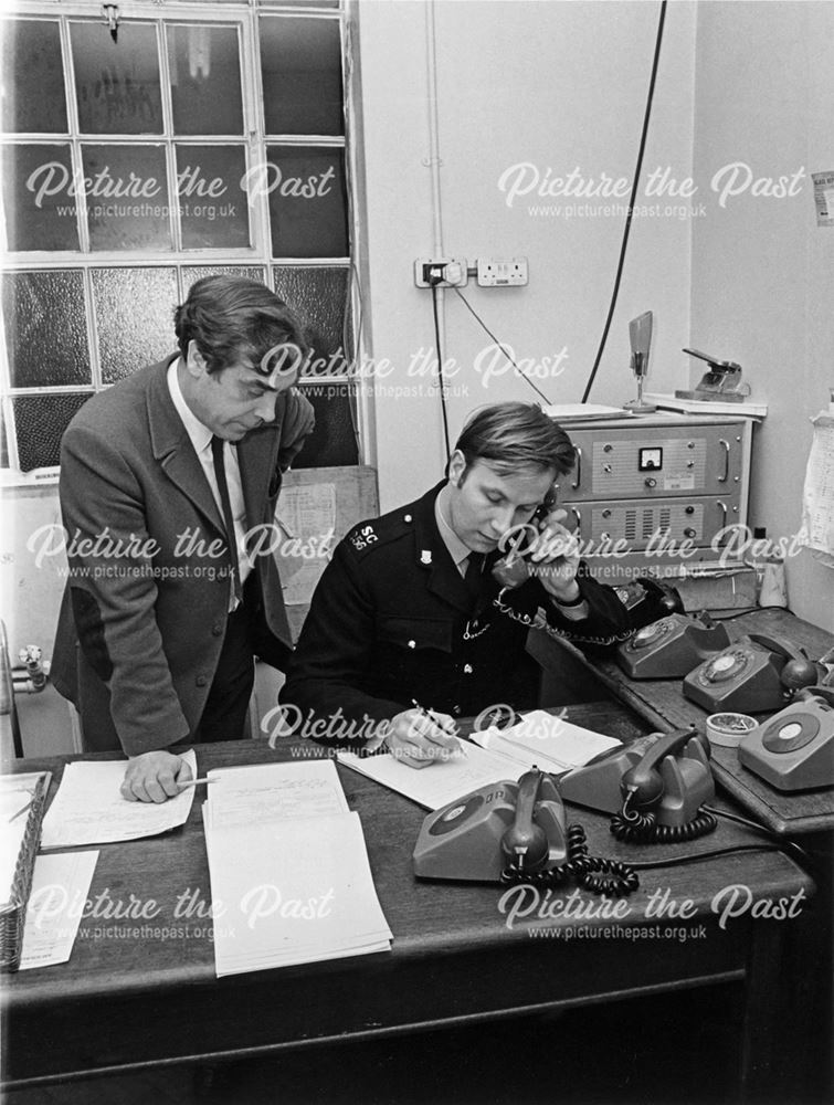 Derbyshire County and Borough Police sub-division control room. S.C Philip Ward and Civilian Jerry B