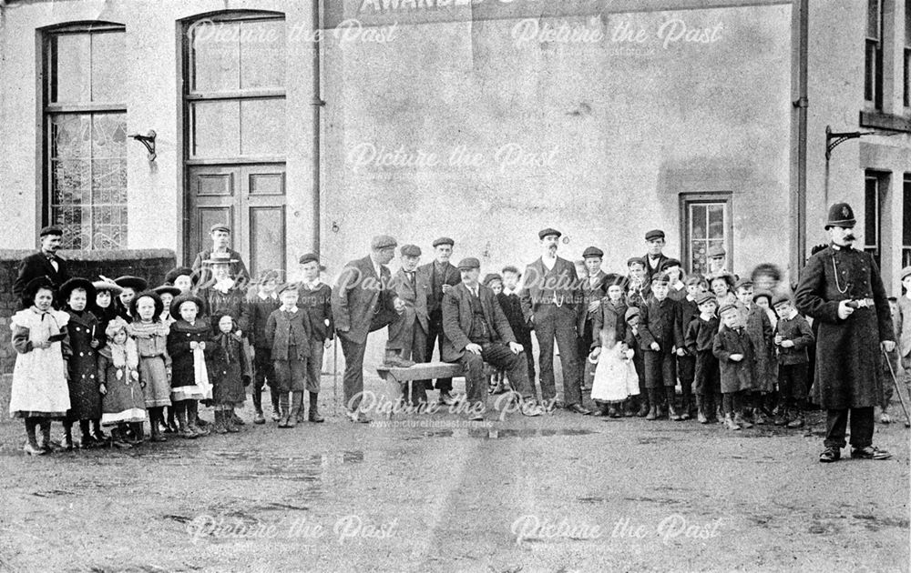 Crowd of people and policeman