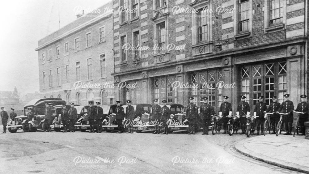 The police station and officers.