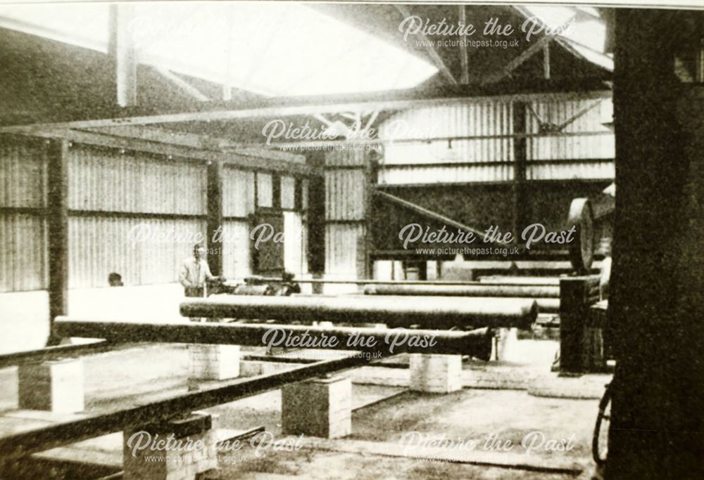 Weighing and testing pipes at the Sand Spun Plant