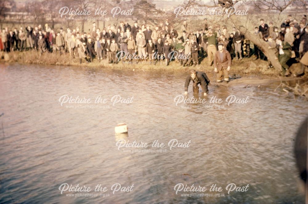 Shrovetide Football Game: The ball has gone in the water