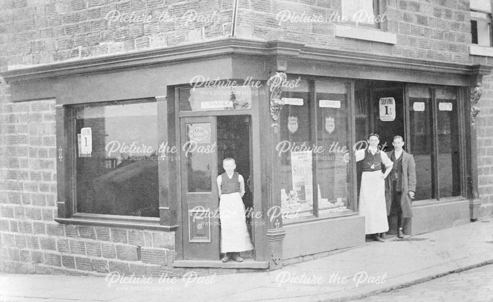 E. Bouchey, Barber shop on the corner opposite the New Lamp