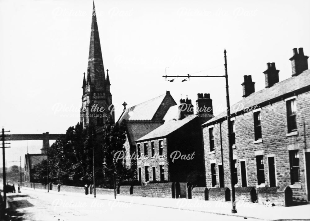 Dinting Vale Road showing Dinting Holy Trinity Church