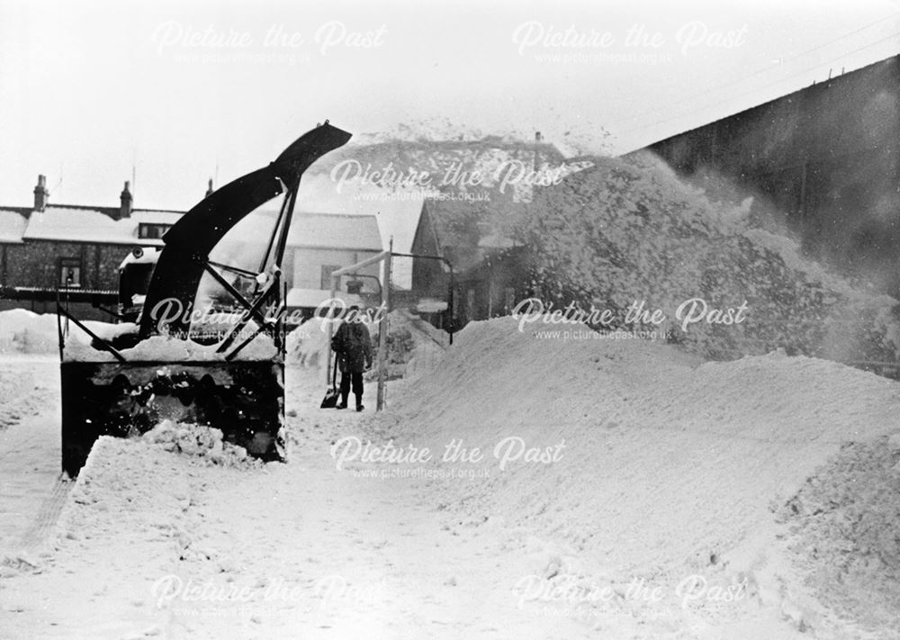 Clearing snow off the pitch, Buxton Football Club, Silverlands, Buxton, 1963