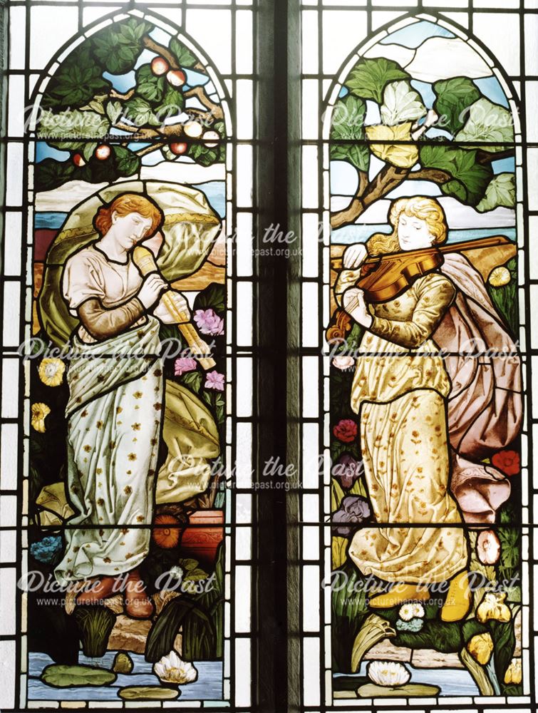 Wingless Angels: a detail from the main staircase window at Thornbridge Hall.