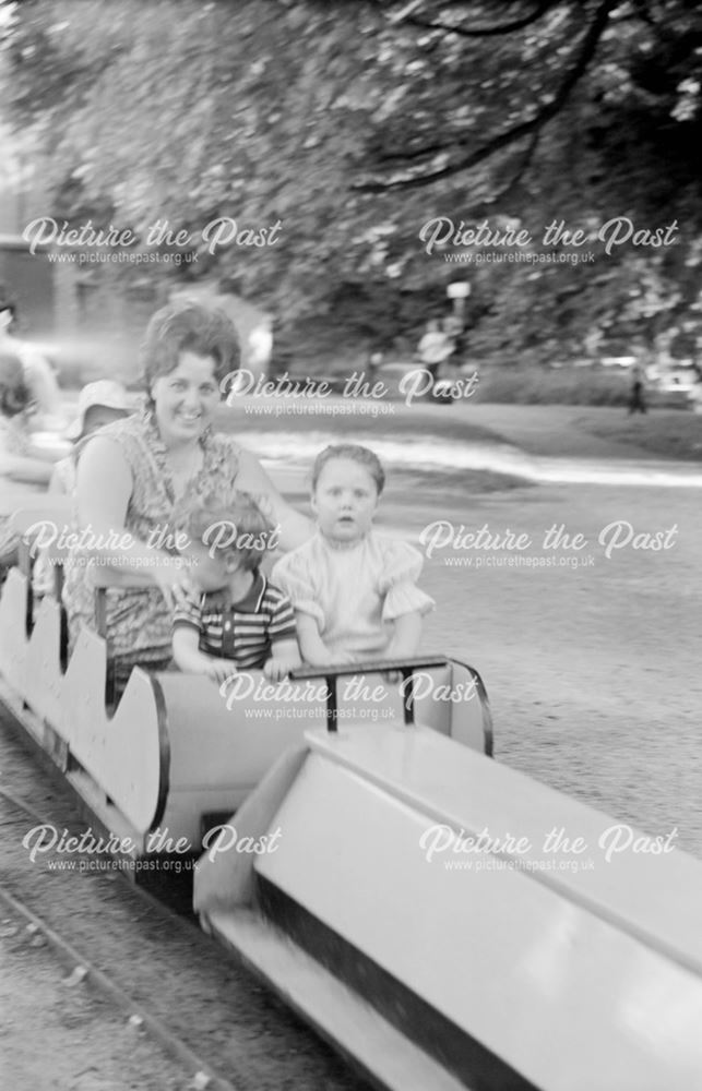 Woman and children riding the Model Steam Train, Hall Leys Park, Matlock