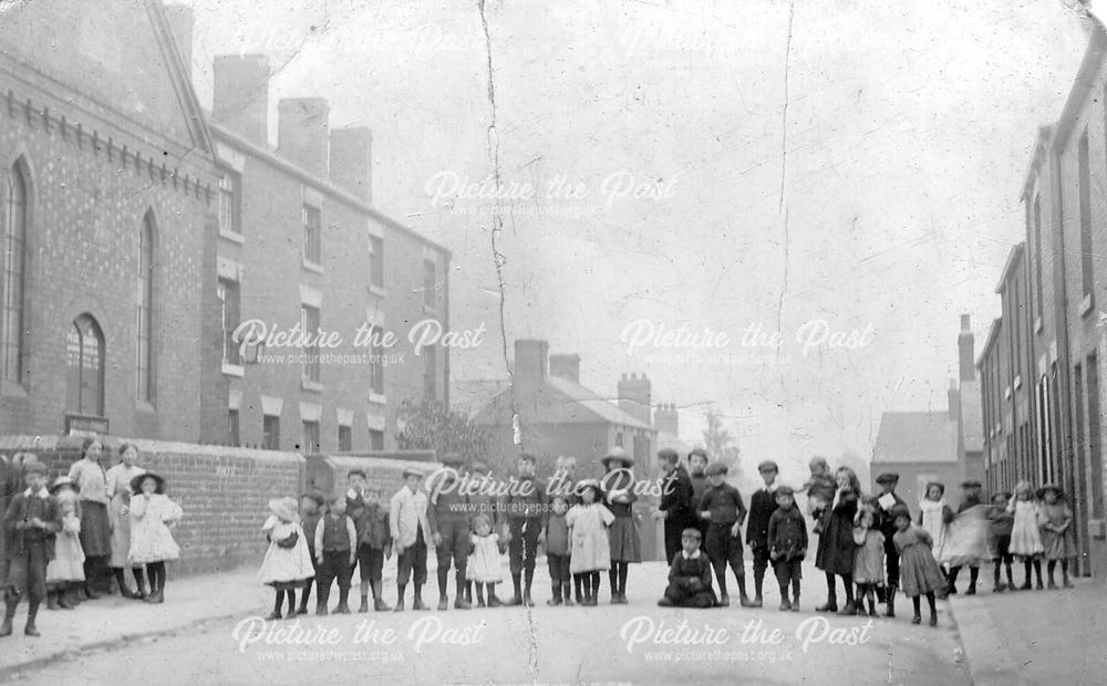 Children standing in Cross London Street