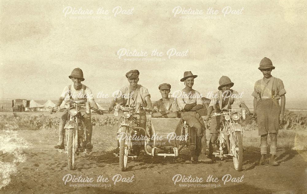 H V Green, despatch rider and others by their motorbikes during service in Egypt, World War 1