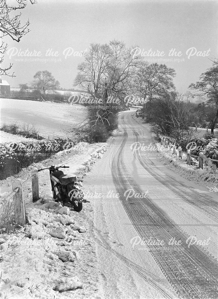 Motor cycle in the snow