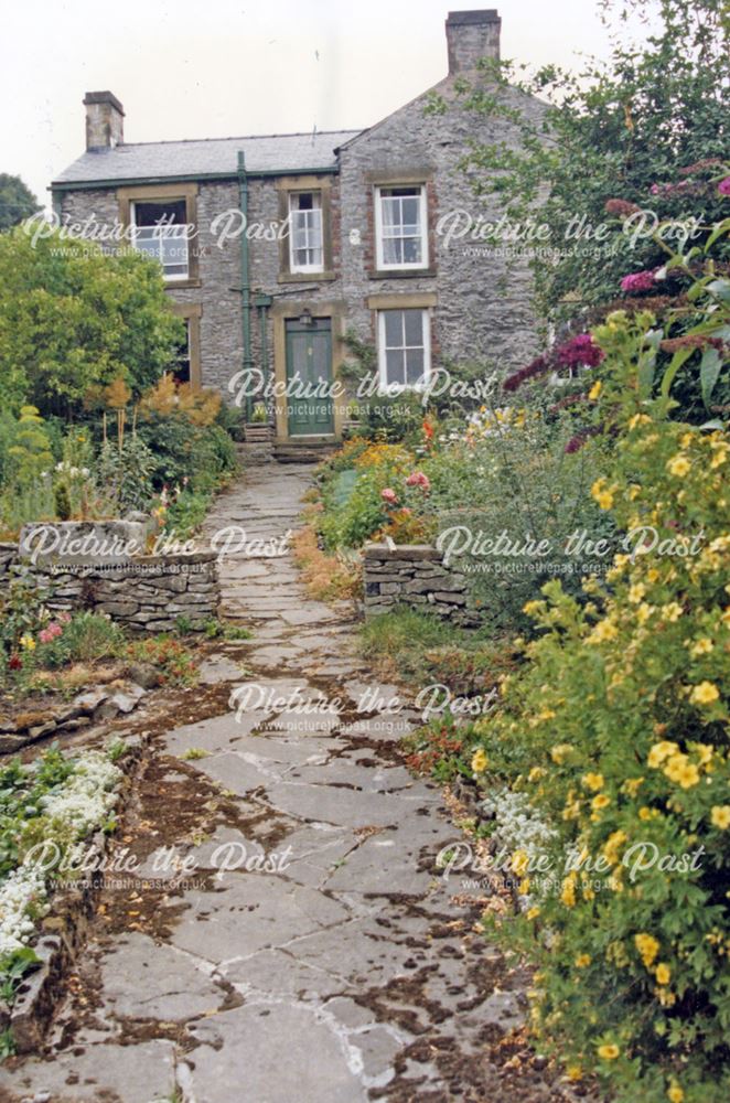 A cottage + cottage garden