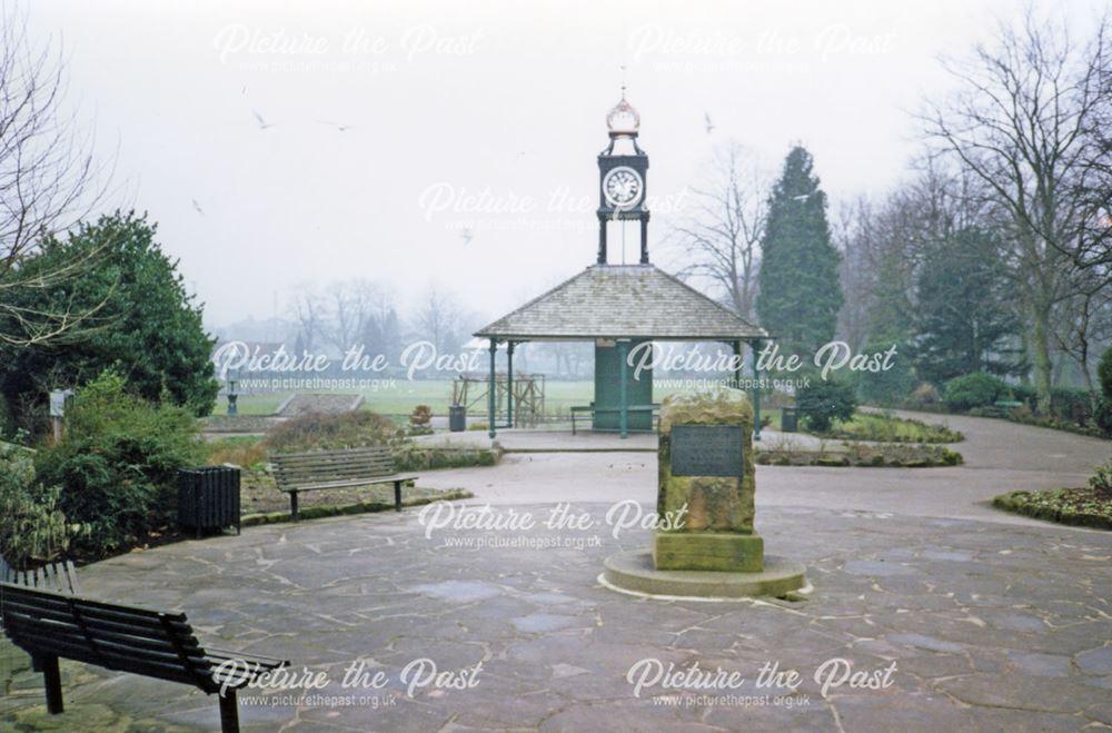 Clock and Memorial in park