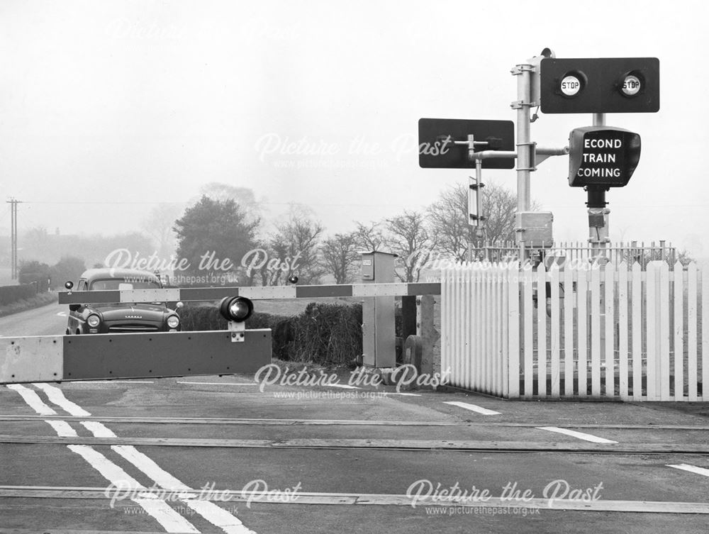 Spath level crossing near Uttoxeter in Staffordshire. February 1961