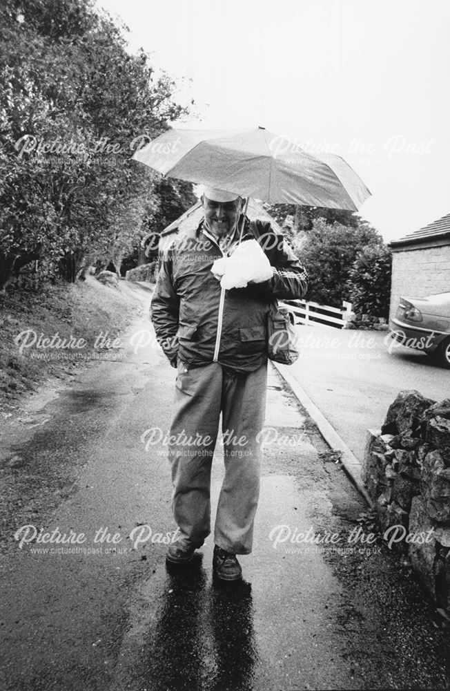 Ray Powell in the rain, returning from Longcliffe Quarries