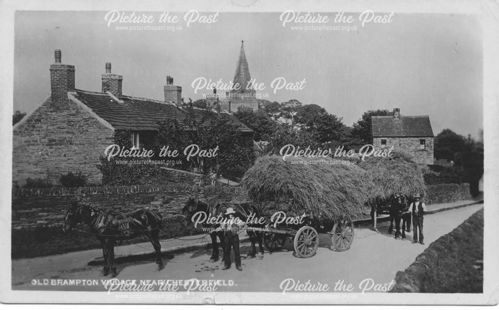 Village scene with hay waggons