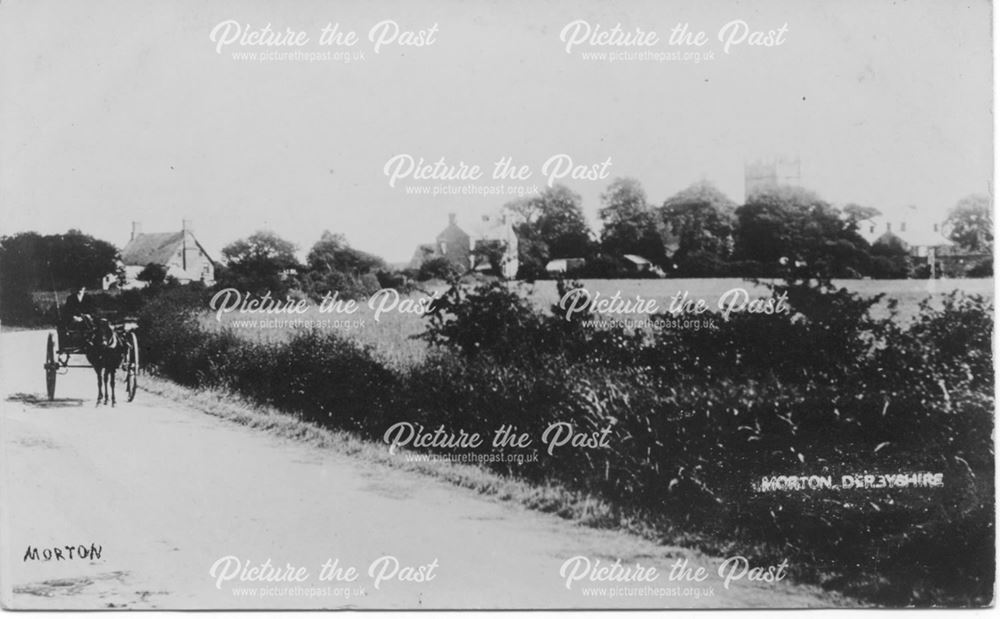 Lane in village with horse and cart