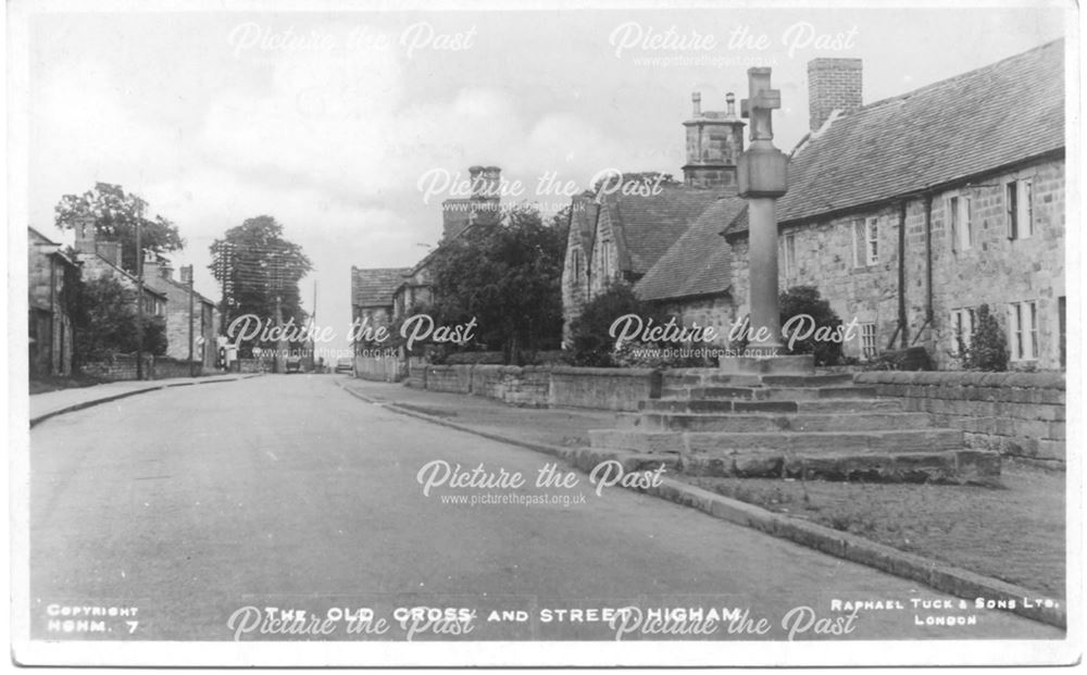 Old cross and street Higham