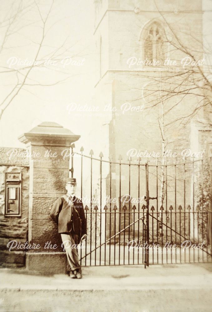 Postman outside St Giles' Church