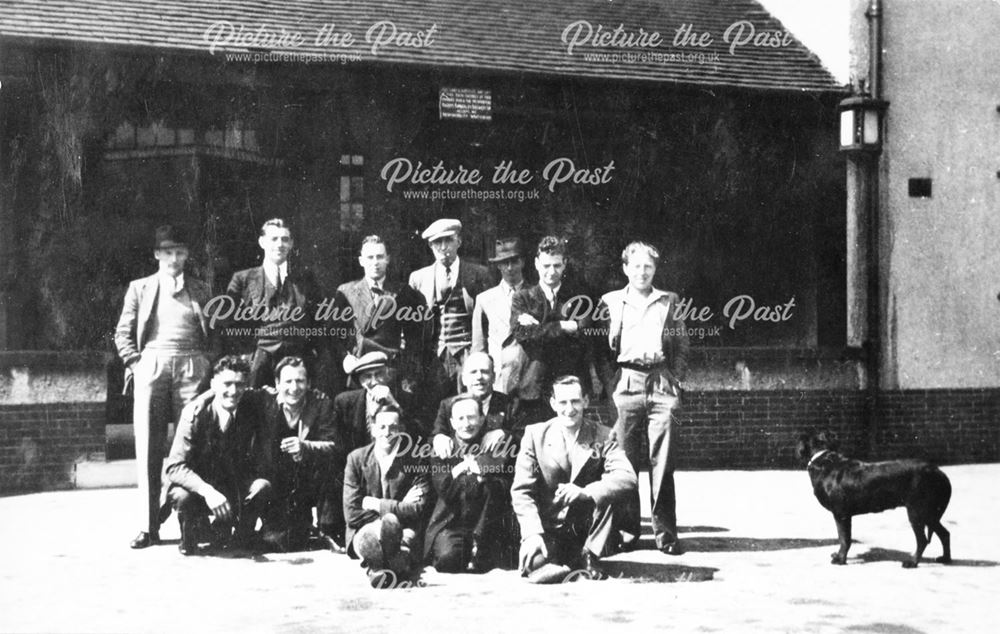 Group of men (and a dog) outside the Williamthorpe Hotel