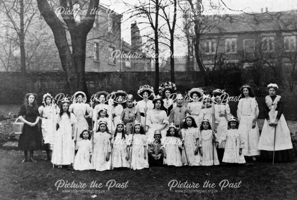 Group in costume on the lawn of the Old Rectory