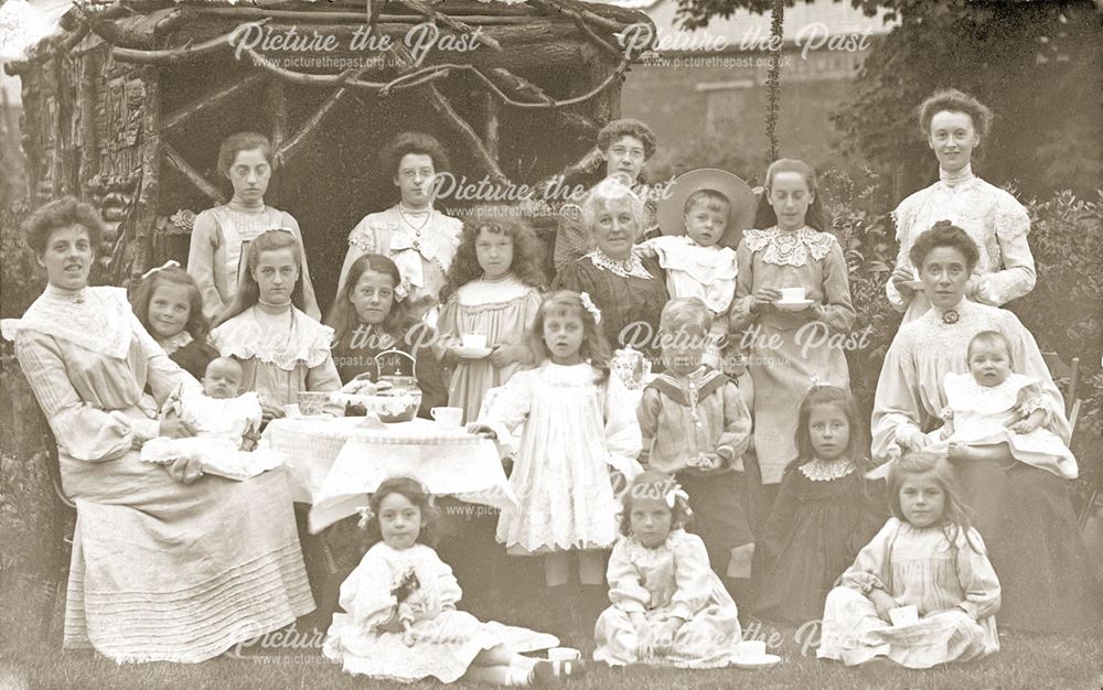 Mary Milner as a little girl with the female members of her family (and one small boy)