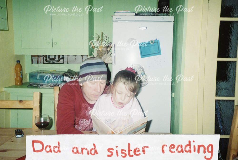 Dad and Sister Reading
