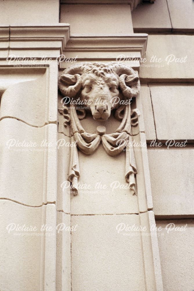 Architectural detail of a ram's head on the facade of the Co-operative building, East Street